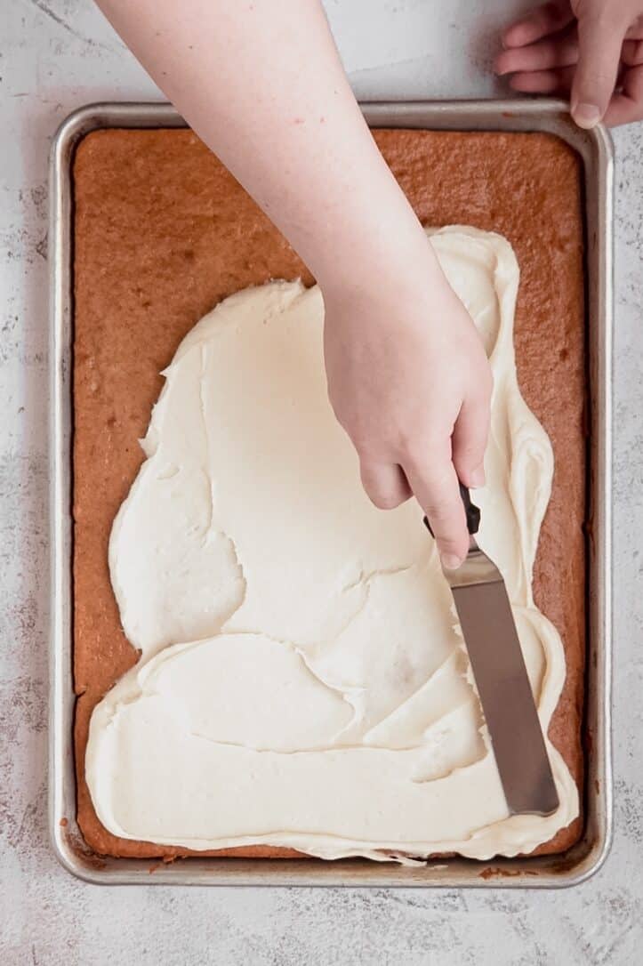 spreading-cream-cheese-frosting.