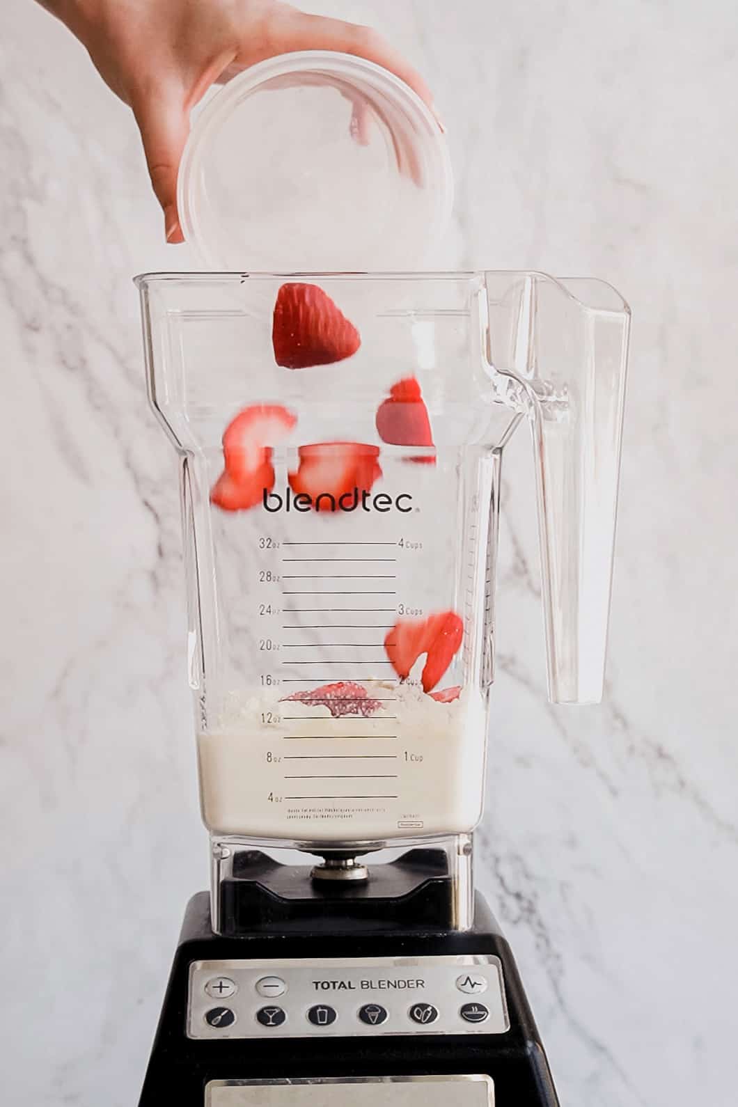 add-strawberries-to-blender.