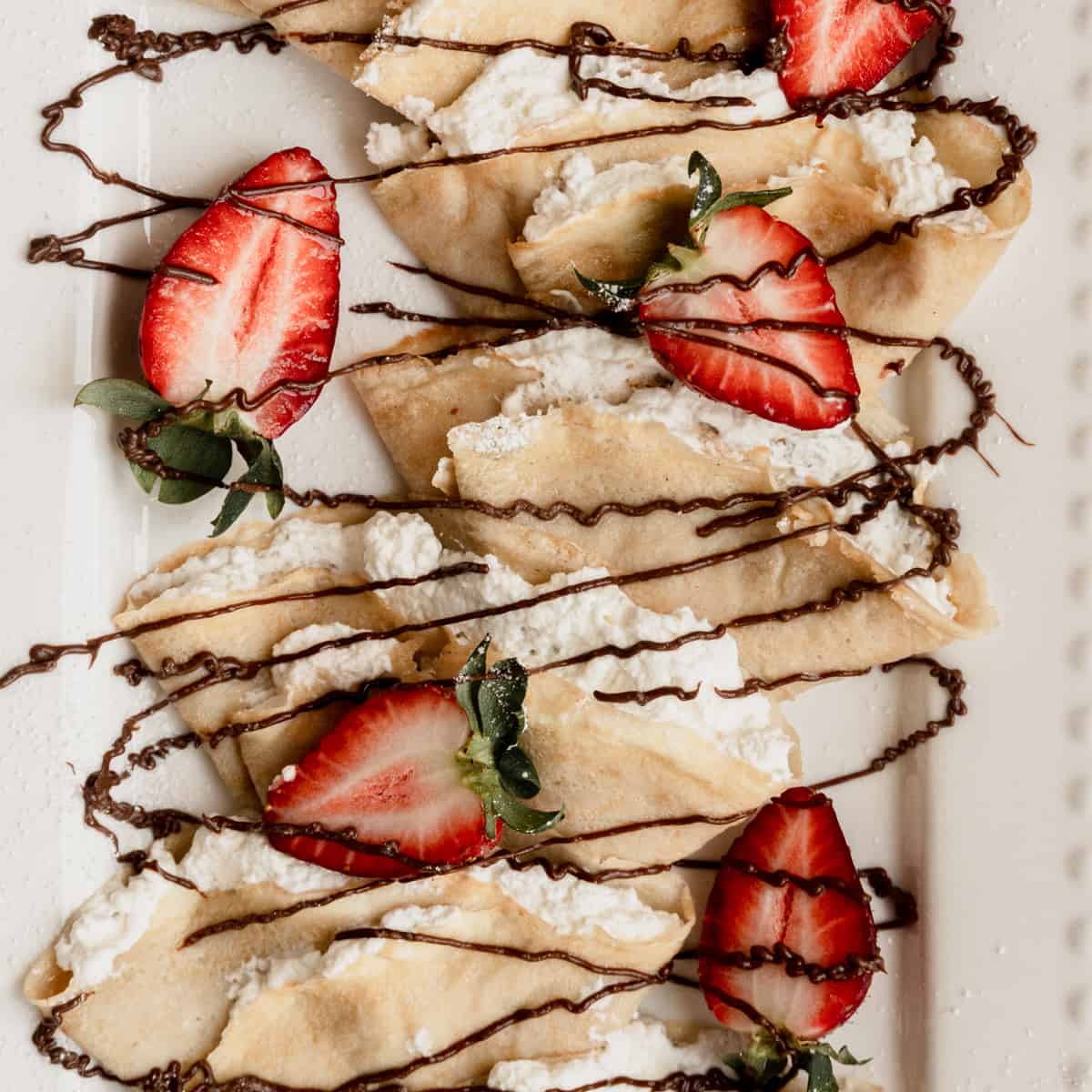 crepes-with-strawberries-and-cream-featured.