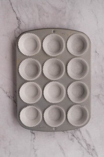 fill-cupcake-tin-with-liners.